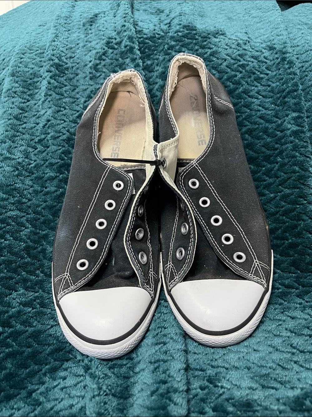 Converse Black Canvas Slip-On Sneakers with White Toe Cap